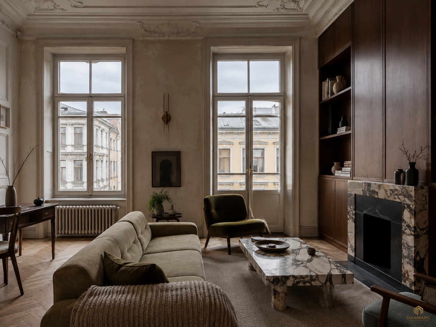 Living room with two tall windows onto historic facades, an ornate plaster cornice, walnut built-in shelving and a patterned stone fireplace