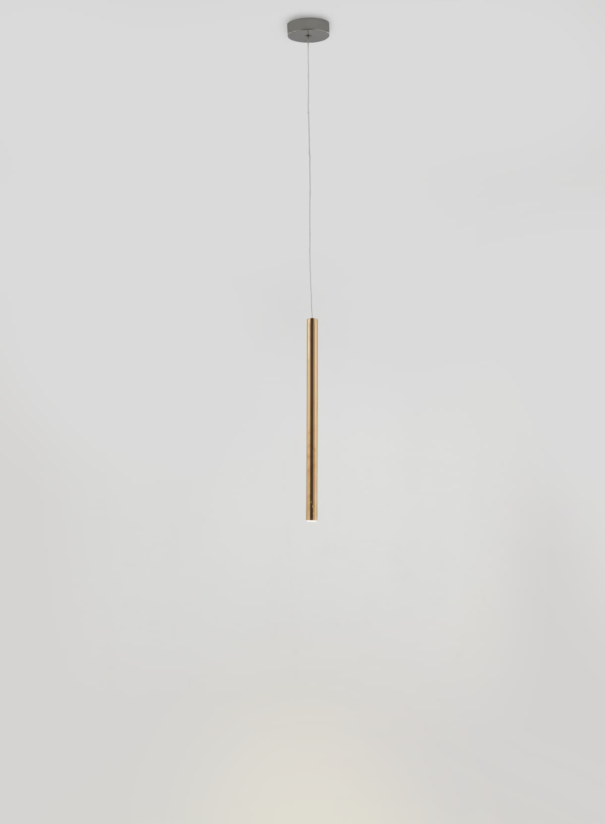 Aromas del Campo Mika pendant lamp in shiny gold, on a light grey background